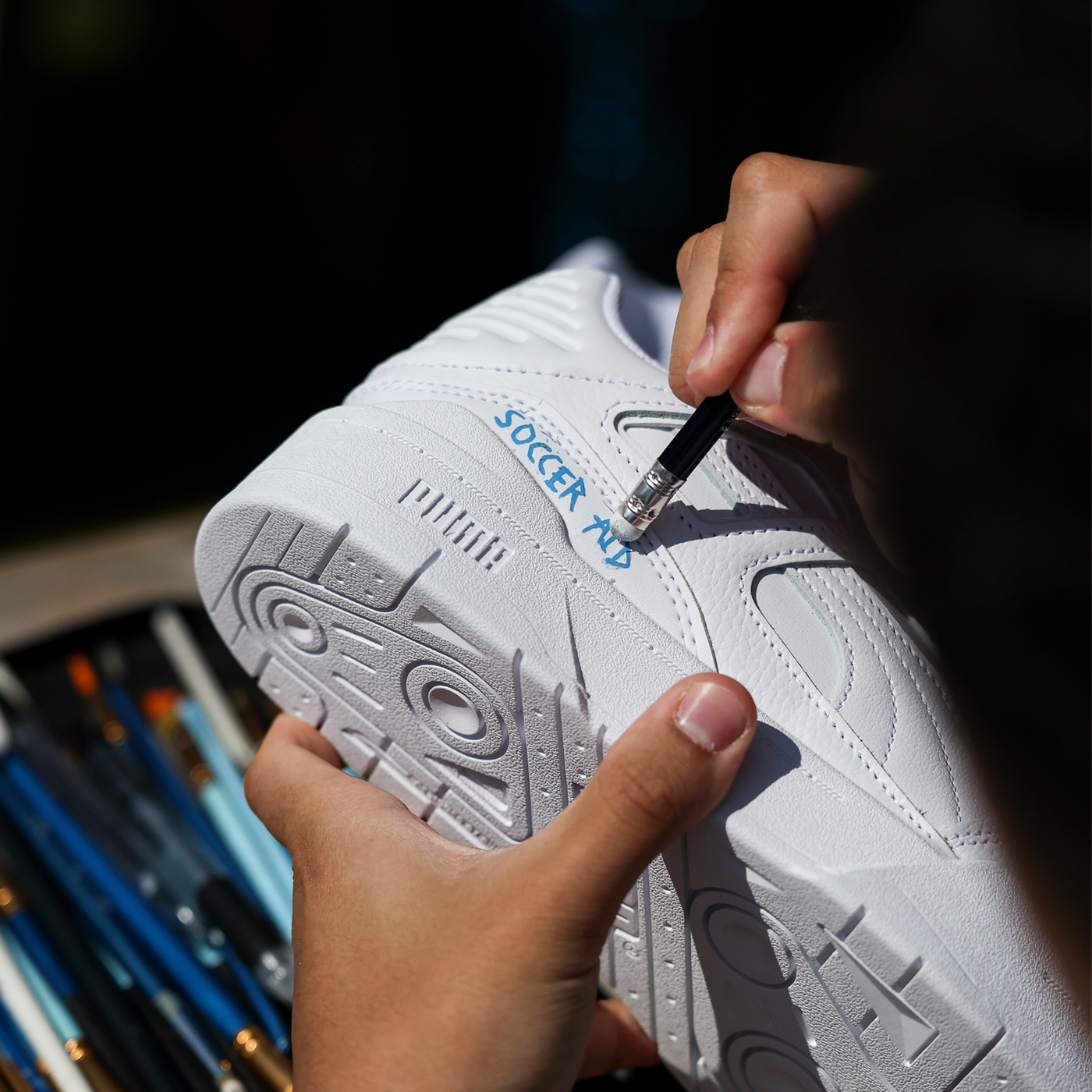 Close Up Of Creator Working On Puma