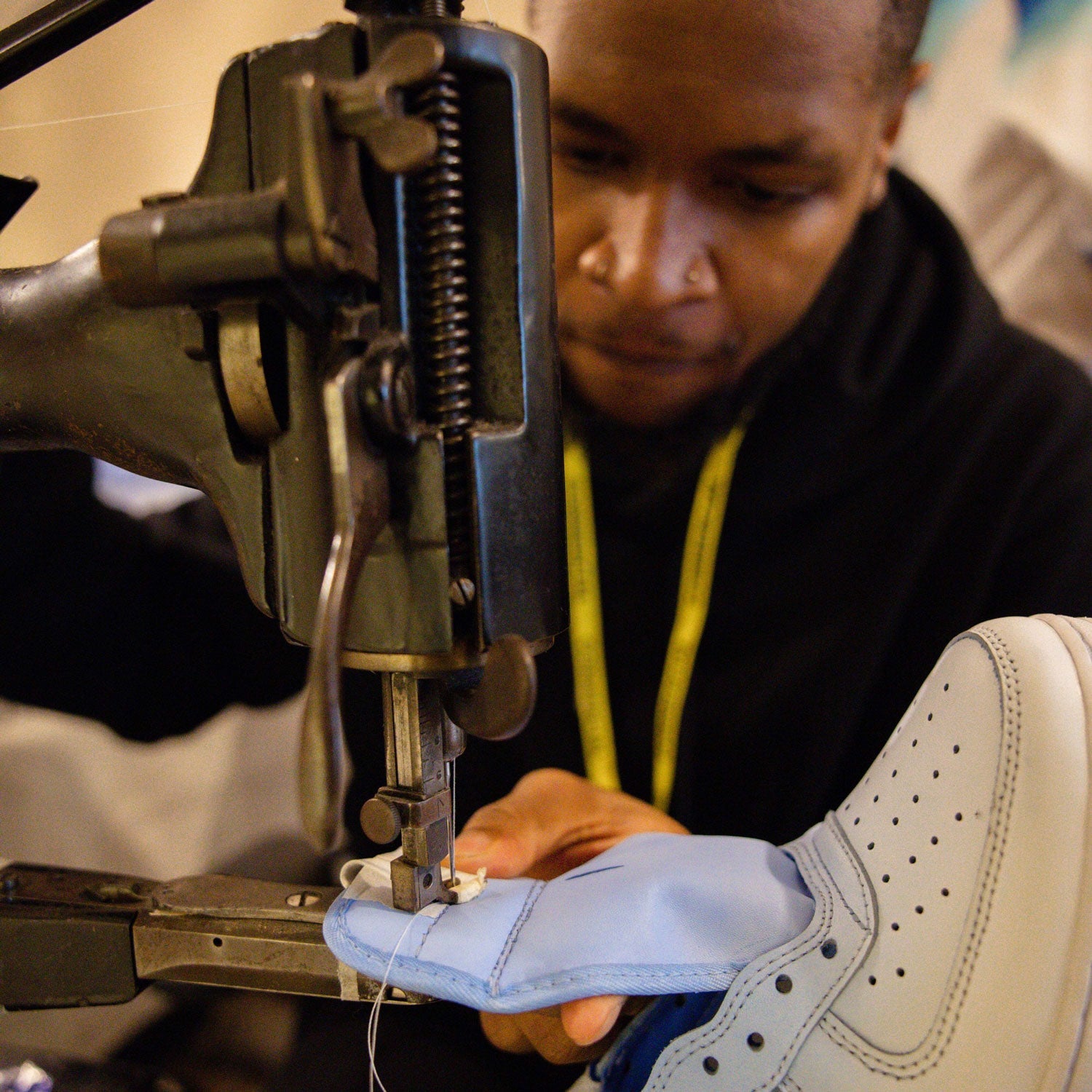 Adding custom tongue tabs to the custom Three Lions Air Force 1 sneakers