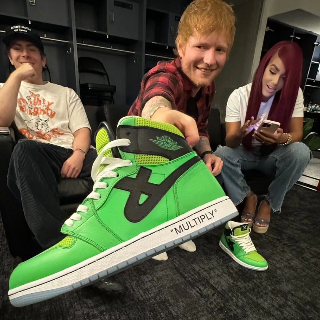 Ed Sheeran Posing with his custom multiply sneakers from CANVVS