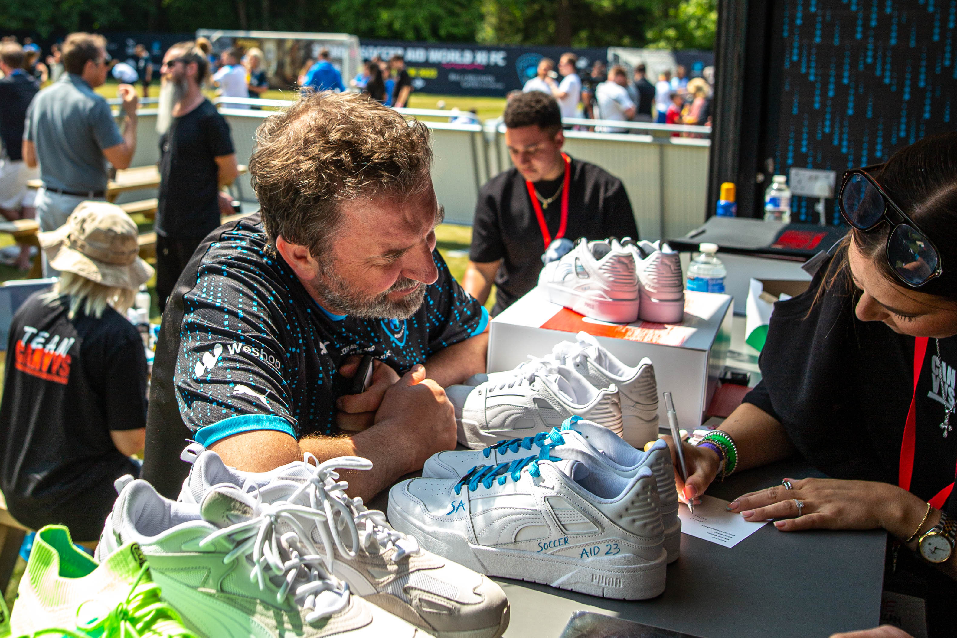 ComEdian Lee Mack Choosing his Soccer Aid Customised Sneakers