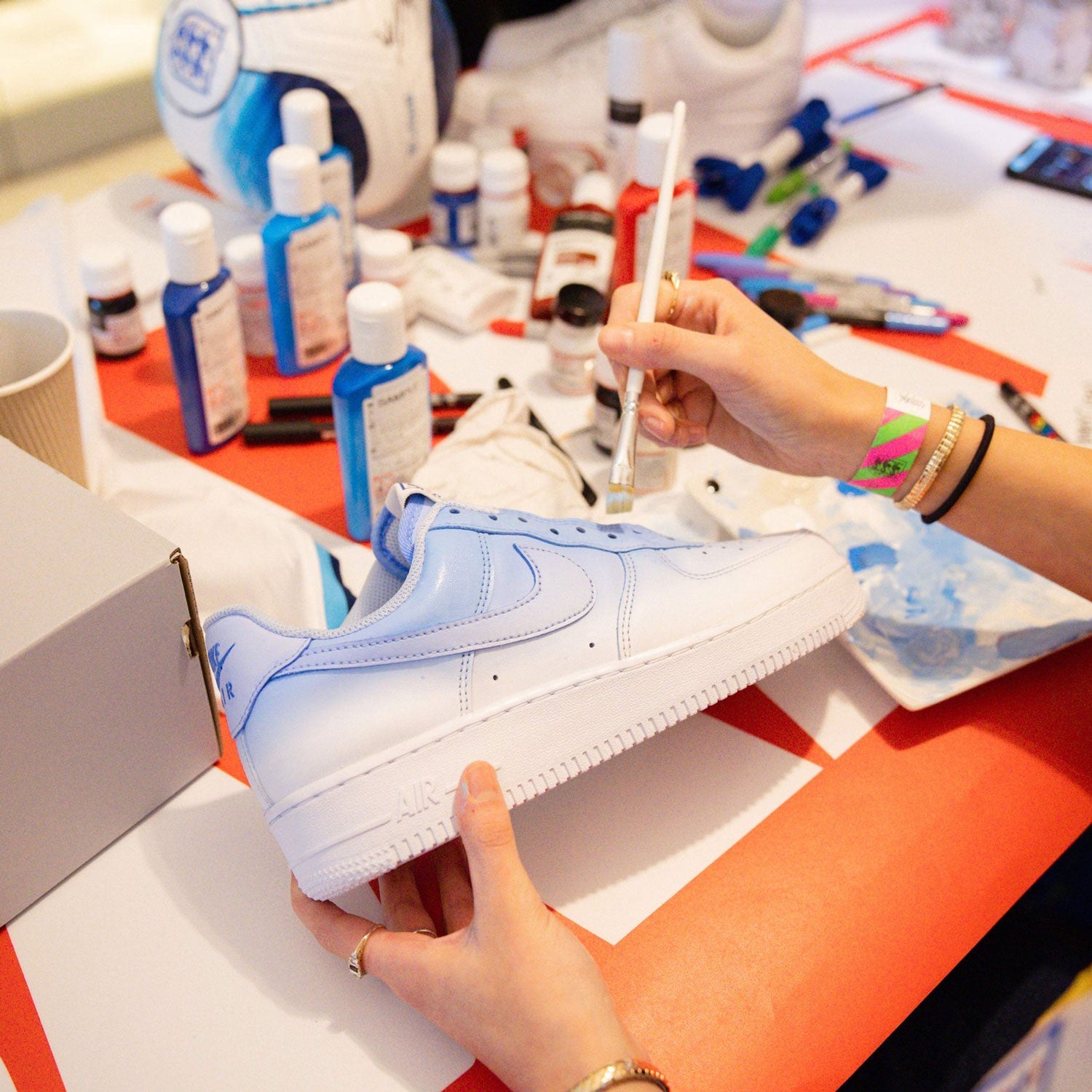 Custom Air Force 1s Being painted for England Mens Football Team